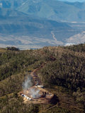 Smoke Rises from a Drilling Rig on the Roan Plateau Photographic Print by Peter M. Fredin