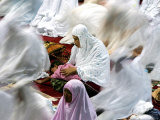An Indonesian Woman Looks after Her Sleeping Son Photographic Print