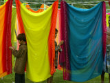 A Washerman with His Children Hang Clothes Photographic Print by Rajesh Kumar Singh