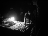 An Afghan Vendor Sells Eggs by Lantern Light Photographic Print