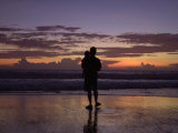 A Father and Son Enjoy Sunset by a Beach Photographic Print
