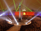 People Watch a Light Show Photographic Print