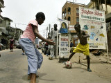 Youths Play Soccer Photographic Print