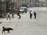 Children Play Soccer on a Deserted Street of Katmandu, Nepal Photographic Print
