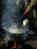 A Man, 24, from Ghana, Prepares His Meal Photographic Print