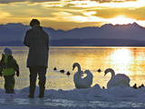 A Mother and Child Feed Water Fowl on the Ice Covered Shores of Lake Chiemsee Photographic Print