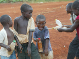 Children Play with Water Near a Zimbabwean Movement for Democratic Change (MDC) Election Rally Photographic Print