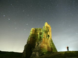 Stars in the Sky are Seen Over a Remains of Medieval Fortress Photographic Print