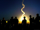 The Sky is Lit by an Israeli Flare Photographic Print