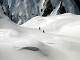 Two Mountain Hikers are Dwarfed by the Winter Landscape of the Formazza Valley Photographic Print