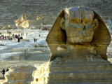 Tourists Stroll by Sphinx at the Historical Site of the Giza Pyramids, Near Cairo, Egypt Photographie