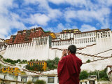 Tibetan Monk with Potala Palace, Lhasa, Tibet, China Photographic Print by Keren Su