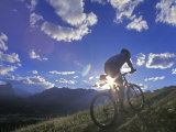 Mountain Biker at Sunset, Canmore, Alberta, Canada Photographic Print by Chuck Haney