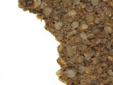 Close-up of a Rough Eaten Granola Bar with Chunks of Grains Fotografická reprodukce Close-up of a Rough Eaten Granola Bar with Chunks of Grains Fotografická reprodukce