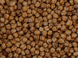 A Large Pile of Round Brown Nuts Photographic Print