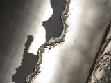 Jagged Edge of Textured Metal Lámina fotográfica Jagged Edge of Textured Metal Lámina fotográfica