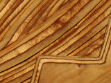 Close-up of Smooth Detail Lines Carved into a Piece of Wood Photographic Print