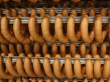 Many Sausages Hanging from Racks Photographic Print