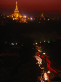 The Almost 300-Foot Tall Golden Stupa of Shwedagon Paya Dominates the City, Yangon, Myanmar (Burma) Photographic Print by Jerry Alexander