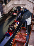 Overhead of Gondolier and Passangers in a Narrow Canal, Venice, Italy Photographic Print by Ryan Fox