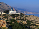 Small Whitewashed Church in Rocky Coastal Area Near Village of Loutro, Loutro, Greece Photographic Print by Trevor Creighton
