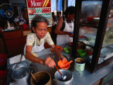 Woman Cooking in Street Stall, Mersing, Malaysia Photographic Print by Chris Mellor
