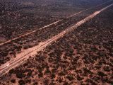 Trans-Continental Railway Line Crossing Outback, Australia Photographic Print by Diana Mayfield