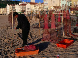 Man on Beach Making Fishing Nets, Nazare, Portugal Photographic Print by Mason Florence