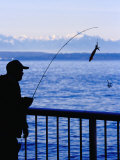 Fisherman on Waterfront Park, Seattle, Washington, USA Photographic Print by Lawrence Worcester