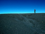 Man Walking on Rim of Irazu Volcano Crater, Against Blue Sky, Cartago, Costa Rica Photographic Print by Eric Wheater