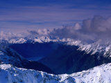 Snowy Mountain Ranges, Fiordland National Park, New Zealand Photographic Print by Nicholas Reuss
