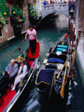 Gondola with Passengers Gliding Through Narrow Canal, Venice, Italy Photographic Print by Glenn Beanland