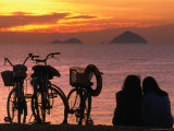 Couple at Beach at Sunrise, Nha Trang, Vietnam Photographic Print by John Banagan