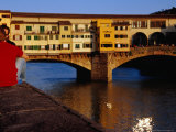 Men Sitting on Wall Near Ponte Vecchio, Florence, Italy Photographic Print by Glenn Beanland