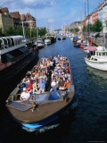 Boat Touring Canals of Christianshavn, Copenhagen, Denmark Photographic Print by John Borthwick