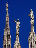 Stone Statues Stand Atop the Spires of the Duomo, Milan, Lombardy, Italy Photographie par Setchfield Neil