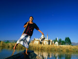 Woman Balancing in Boat on Lake, Inle Lake, Myanmar (Burma) Photographic Print by Juliet Coombe