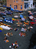 People on Black Volcanic Sand Beach, Rinella, Sicily, Italy Photographic Print by Dallas Stribley