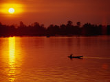 Fisherman Heading Out for Night Fishing Under Mekong River Sunset, Si Phan Don, Laos Photographic Print by Woods Wheatcroft