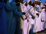 Men Performing Dance, with Sticks, Abu Dhabi, United Arab Emirates Photographic Print by Chris Mellor