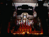 Offerings at Buddha Statue in Main Assembly Hall of Pelkor Chode Monastery, Gyantse, Tibet Photographie par Richard I'Anson