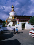 Boys Outside Memorial Chorten, Thimphu, Bhutan Photographic Print by Nicholas Reuss