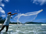 Fisherman Casts His Drift Net off Patong Beach, Patong, Phuket, Thailand Photographic Print by Tom Cockrem