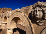 Gorgon Medusa Head on the Arches of the Severan Forum, Leptis Magna, Al Khums, Libya Photographic Print by Doug McKinlay