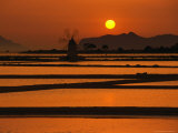 Sunset Over the Saltpans and a Windmill on San Pantaleo, Sicily, Italy Photographic Print by Dallas Stribley