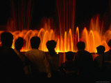 People Silhouetted Against Water Fountain on the Bund, Shanghai, China Photographic Print by Dallas Stribley