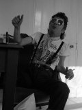 Ian Dury Poses During an Interview for the Daily Mirror in His Offices in Paddington London, 1981 Photographic Print