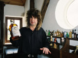 Black Sabbath Singer Ozzy Osbourne Holding a Large Bottle of Whiskey at His Home in 1988 Photographic Print