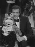 Roger Moore Meets Miss Piggy from the Muppets Photographic Print