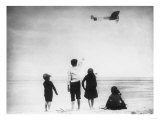 Children Watching Louis Bleriot Flying Plane Photograph - Calais, France Poster